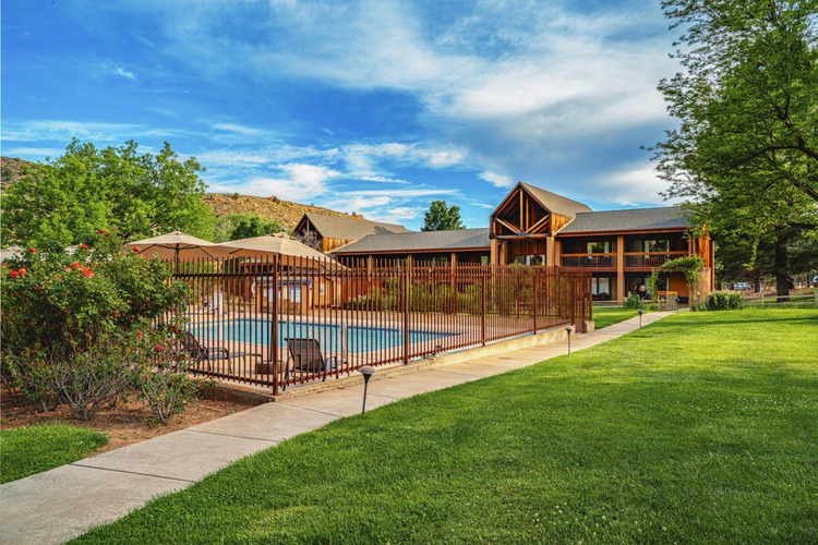 Outdoor pool with lodge exterior
