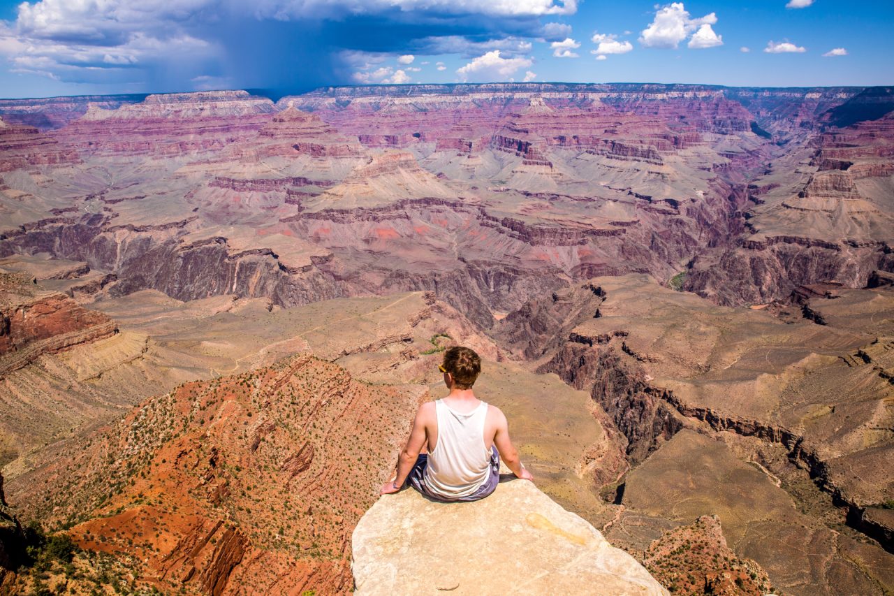Man sitting on canyon